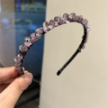 Handmade headband featuring purple crystal stones and grey faceted beads on black wire - Purple