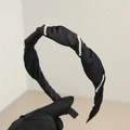 Elegant black satin headband with pleated texture and white faux pearls in retro style - Black