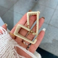 Chic rectangular cream leather hoop earrings with vintage gold metal clasp detail - Rectangle / Off White