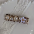 Eleganter Tweed-Haarclip mit Kunstperlen, Strasssteinen und lila Blumendetails - Braun