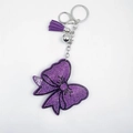 Sparkling crystal bow keychain with purple velvet tassels and silver bell bag charm - Purple