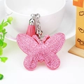 Llavero de mariposa con strass rosa con borla de cuero y cadena de plata - Rosa