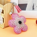 Schlüsselanhänger mit rosa-weißer Strass-Sonnenblume, Lederquaste und silberner Glocke - Rosa