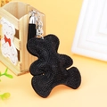 Detail of black rhinestone bear keychain with leather tassel and silver hardware - Black