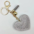 Detail of grey leather heart keychain with luxury crystals and gold tassel pendant - Gold Tone + Grey Base With Clear Rhinestones