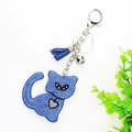Detailed blue rhinestone cat keychain with leather tassel and silver bell accessory - Blue