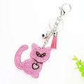 Portachiavi gatto con strass rosa con nappa morbida e campanellino d'argento lucido - Rosa