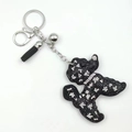 Sparkling black and white rhinestone teddy dog keychain with sleek black leather tassel - Black