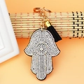 Detail of Hamsa Hand keychain with sparkling rhinestones and a black tassel charm - Black With White Rhinestone