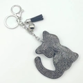 Porte-clés chat mignon avec strass gris, franges en cuir noir et petite cloche argentée - Métal canon