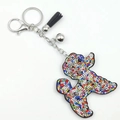 Porte-clés chien teddy en strass brillants avec pompon noir et clochette argentée - Multicolore