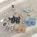 Velvet rhinestone dog keychains with tassels in black, blue, white, and champagne colors - Custom Colors