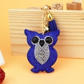 Detail of owl keychain with blue rhinestones, golden bell and deep blue tassel decor - 60*50 / Blue