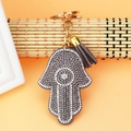 Detail of Hamsa Hand keychain with silver rhinestones and brown suede tassel charm - Gray