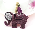 Sparkling purple rhinestone elephant keychain with golden bell and purple tassel charm - Purple