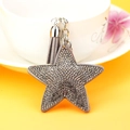 Portachiavi a stella in velluto grigio con strass luccicanti e nappa su tazza bianca - 65*65mm / Grigio