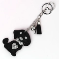 Lindo llavero de perro negro con diamantes de imitación, campana y borla de ante - Negro