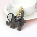 Deep grey elephant keychain with sparkling rhinestones, golden bell and tassel - Gray