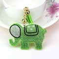 Green rhinestone elephant keychain with matching green tassel and golden bell accessory - Fruit Green