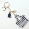 Portachiavi mini borsa nera con strass, chiusura dorata e nappa in pelle elegante - Nero