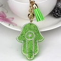 Hamsa hand keychain with green rhinestones and tassel in gold-tone metal finish - Green