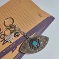 Sparkling Evil Eye rhinestone keychain with grey tassel and silver metal accents - Gray And Lake Blue