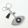 Sparkling Evil Eye keychain with blue rhinestones, black leather tassel and silver charm - White