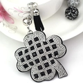 Sparkling four-leaf clover keychain with black crystals, white rhinestones and black tassel - Black