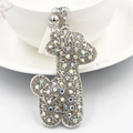 Close-up of sparkling giraffe keychain with crystal rhinestones and white tassel detail - Giraffe / White