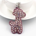 Pudel-Schlüsselanhänger mit rosa Strass und lila Quaste auf weißem Keramikdekor - Lila
