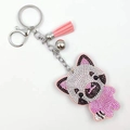 Pink rhinestone panda keychain featuring leather tassel and silver bell accessory - Pink