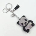 Sparkling rhinestone panda keychain with a black suede tassel and silver bell ornament - Crystal AB