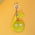 Bright yellow keychain with velvet star, tassel, and sparkling rhinestone smiley face pendant - Smiley Face