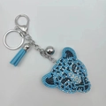 Porte-clés léopard strass bleu avec pompon en cuir bleu ciel et crochet en métal argenté - Bleu lac