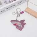 Creative purple shark keychain with rhinestones, tassel, and bell for bag decoration - Purple