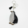 Crystal penguin keychain with black and white rhinestones, silver bell and tassel - Black