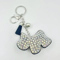 Sparkling crystal dog keychain with dark rhinestones, navy tassel, and silver bell accessory - AB Color