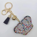 Portachiavi a farfalla con strass colorati, nappa nera e gancio in metallo dorato - Colori Misti