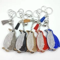 Set of five rhinestone penguin keychains in grey, black, gold, red and blue with tassels - Custom Colors