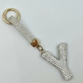 Detail view of rhinestone-studded letter Y keychain with golden spring clip buckle - Style Y