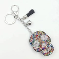 Detail of colorful rhinestone keychain with silver hardware and black leather tassel - Multi-color