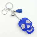 Blue rhinestone skull keychain with silver lobster clasp, small bell, and tassel charm - Royal Blue