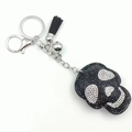 Punk style skull keychain with black rhinestones, silver lobster clasp and leather tassel - Black