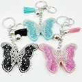Détails des porte-clés papillon avec strass étincelants et pompons assortis - Couleur personnalisable