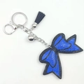 Portachiavi con fiocco in strass blu e nero con nappa nera e campanellino argento - Nero con Blu Reale
