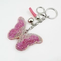 Llavero de mariposa rosa con cristales brillantes, colgante de borla y cierre de mosquetón - Rosa