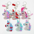 Sparkling crystal unicorn keychains with tassels and bells in various colors - Multi-color