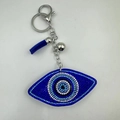 Sparkling rhinestone evil eye keychain with blue tassel and silver bell pendant - Large Round Eye Style
