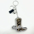 Detail von Cowboy-Stiefel-Schlüsselanhänger mit Leopardenmuster, Strass und schwarzer Quaste - Dunkelkhaki
