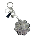 Porte-clés tournesol noir scintillant avec strass, fermoir mousqueton et pompon élégant - Fleur Iridescente AB